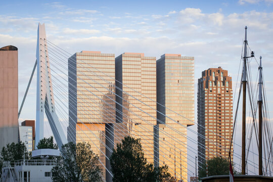 Skyscrapers of Rotterdam, 'Manhattan at the Maas river'. The offices and apartments of the 'Kop van Zuid' with ships at the foreground.
