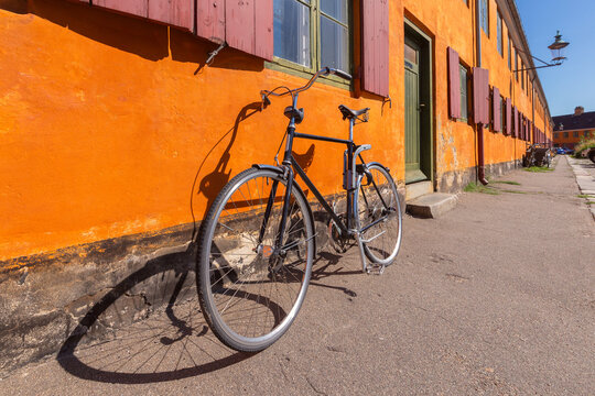 Yellow Historic Building with Bicycles in Copenhagen Denmark