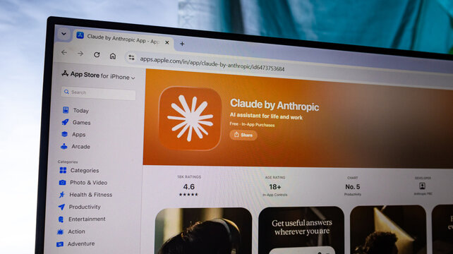 Claude by anthropic app store webpage with orange background displays ai assistant software interface.