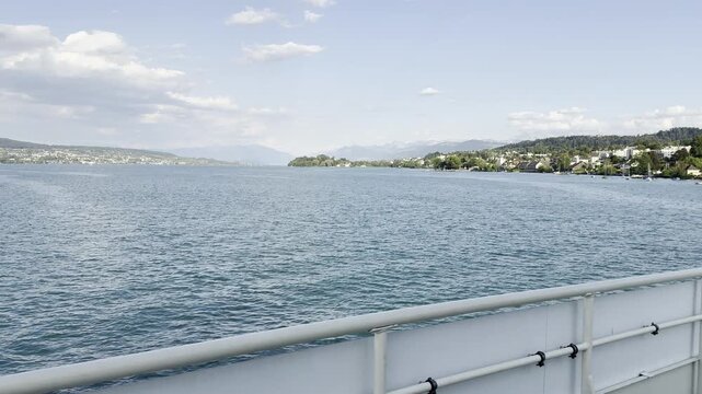 Video of Alpine Mountains Seen From a Ferry on a Swiss Lake