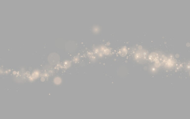Radiant gold glitter explodes into countless bright particles. Warm bokeh enhances the glow. PNG effect creates a luxurious festive overlay. © goldstock