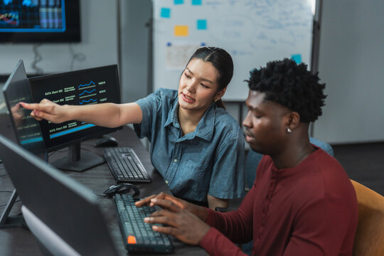 Female and male developers engage in peer discussion exploring AI research concepts and development innovation through collaborative exploration and experimentation.