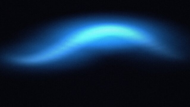 Wavy blue light form with a bright center and soft edges on black