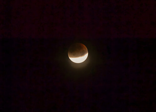 Total Lunar Eclipse - Red Moon in Night Sky
