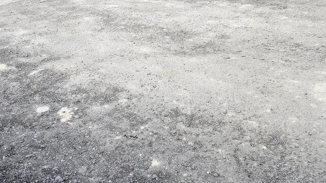 Close up view of rough grey concrete texture background