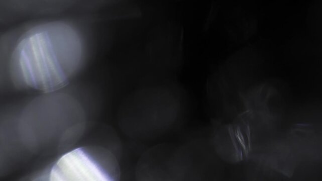 Real Shooted Cinematic Lens Flare Overlay on Black Background at 1000fps Slow Motion.