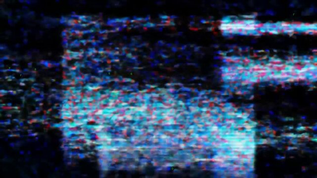 VHS static field with color pixel glitches and noise burst.