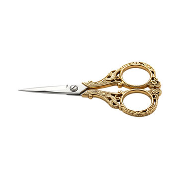 Vintage golden sewing scissors with detailed ornate handle