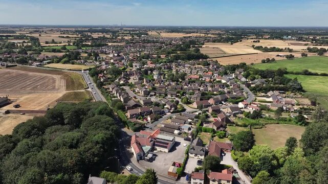 Aerial video of Holme-Upon-Spalding-Moor Yorkshire UK .Holme-on-Spalding-Moor (also known as Holme-upon-Spalding-Moor) is a large village and civil parish in the East Riding of Yorkshire, England