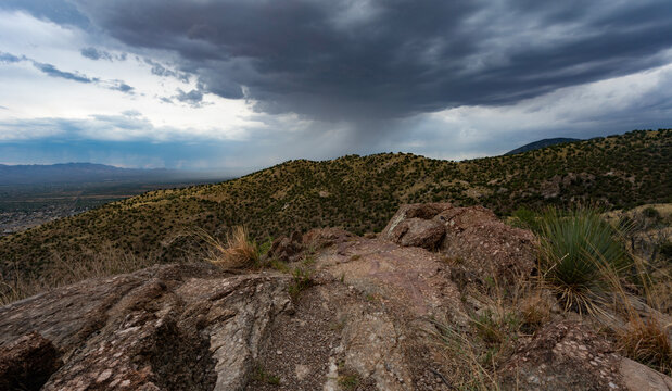 Rainstorm approaching a ridgeline in the Huachuca Mountains