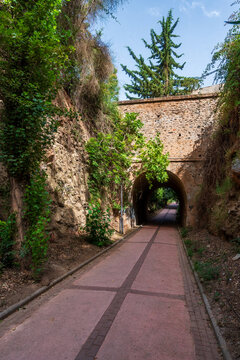 Pedestrian walkway connecting to D&uacute;rcal iron bridge through a tunnel in Padul, Granada