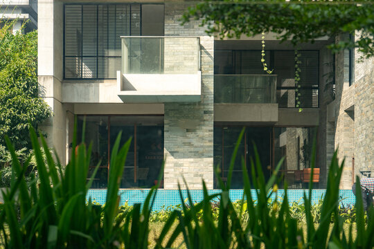 Modern Luxury House with Swimming Pool and Lush Tropical Landscaping