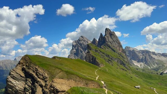  Seceda ridge in the Dolomites, highlighting jagged cliffs and green meadows