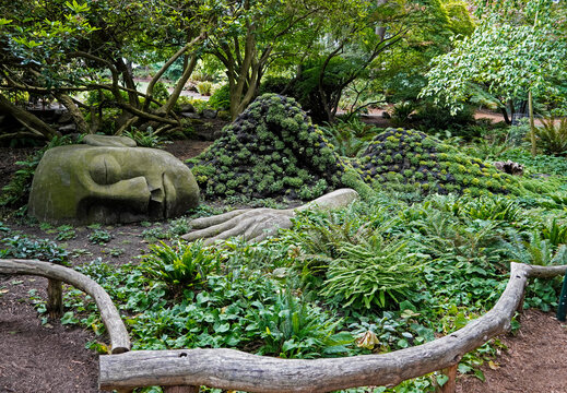 Victoria, British Columbia, Canada - July 23, 2026: The Moss Lady is a sculpture 35 feet long in Beacon Hill Park covered in club moss and cattail moss.