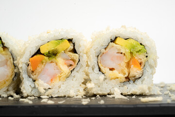 Close Up Uramaki Roll with Avocado and Seafood © nayefhammouri
