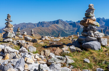 Western Tatras - Krzesanica peak - stone mounds, view of the autumn Tatra peaks © Jacek Jacobi