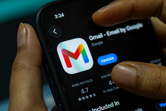 In this photo illustration, a person holds a smartphone displaying the Gmail email by google app on the App Store, in New Delhi, India on 8 August 2026.