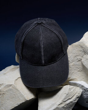 Grey cap placed on gray stones