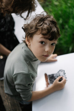 Creative childhood moment captured with outdoor drawing