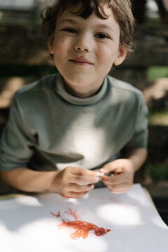 Young artist creating memories with colorful crayons