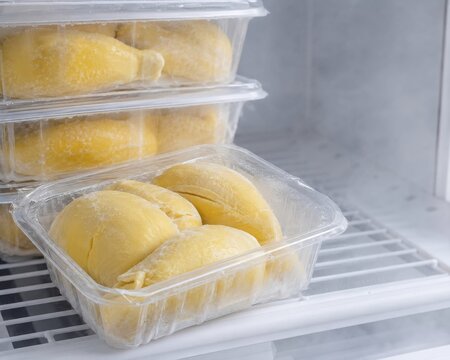 Frozen Durian Pulp in Sealed Trays Inside a Commercial Freezer
