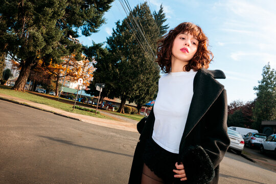 Woman looking away on street