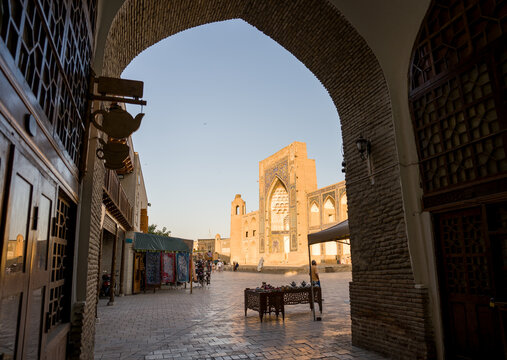 Entrance to a Historic Plaza in Bukhara During Sunset
