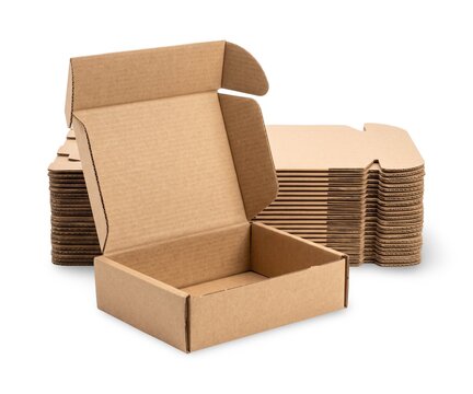 Open cardboard shipping box with flat packed mailer boxes, isolated on white background