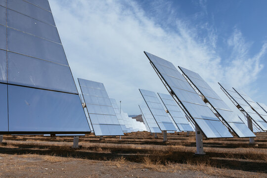 Solar panels reflecting sunlight generating clean energy