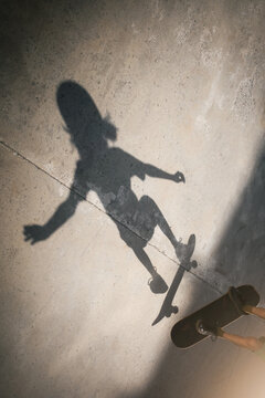 Shadow of a Young Skateboarder