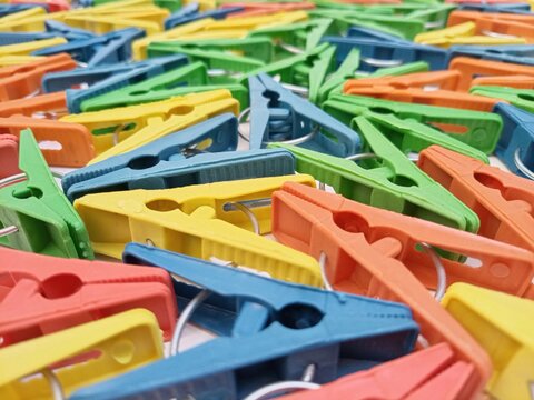 Clothes pins sets background, multi color plastic clothes pegs or laundry clips background