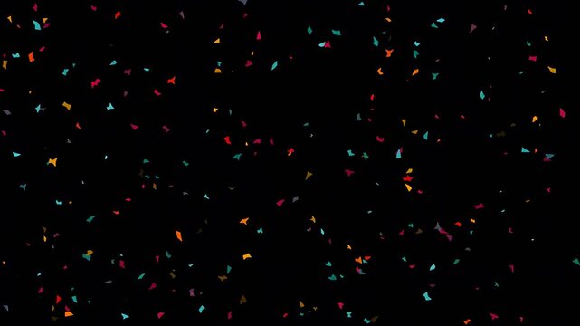 Abstract confetti pattern on black background with colorful sprinkles