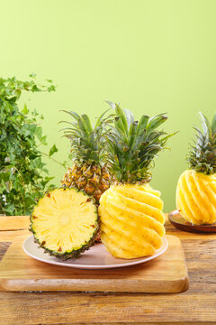 Fresh Sweet Pineapples with Golden Flesh on Wooden Board - Tropical Fruit Display