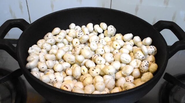 makhana in cast iron kadhai.