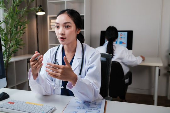 Female doctor discussing patient care during telemedicine consultation