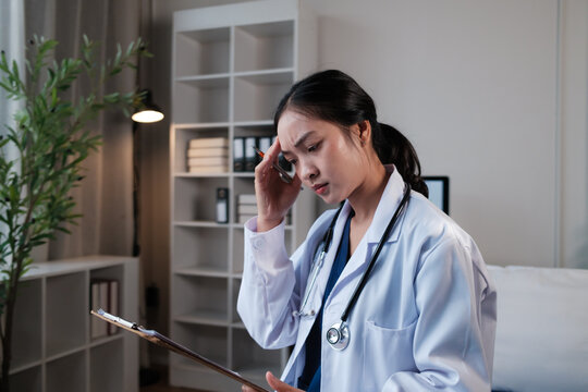 Stressed female doctor experiencing burnout and professional pressure
