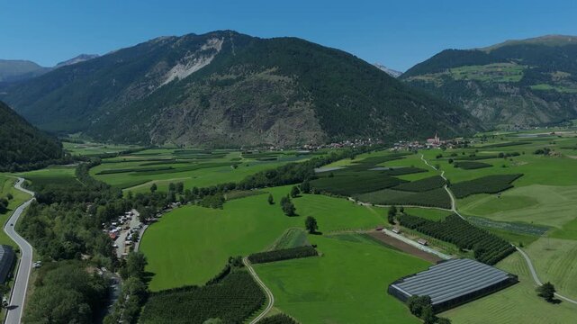 Drone Truck Left Over Vinschgau Valley and Alpine Fields in South Tyrol