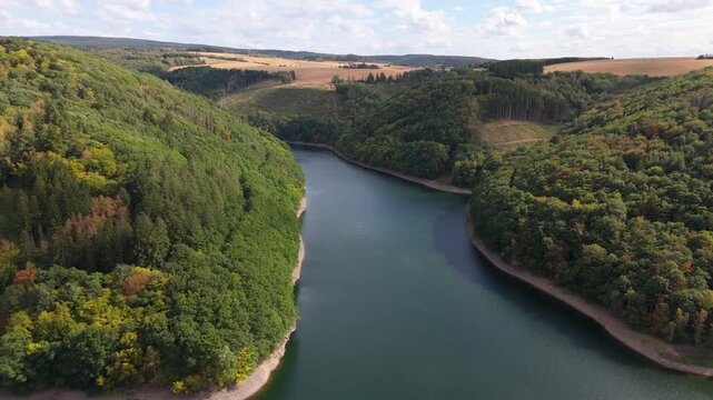 Riveris Dam, drinking water protection area, reservoir surrounded by dense forest, provide for irrigation, hydropower, water supply, flood management, recreation, inland navigation, Trier, Germany
