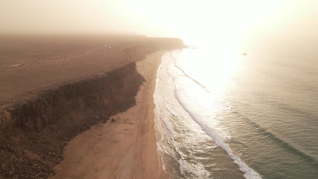 Beach in Fuerteventura, Canary Islands, during a sandstorm, 4k 30fps aerial footage, 1 inch sensor drone