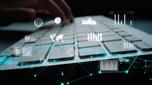 A close-up of a laptop keyboard with overlayed digital graphics representing data visualizations and analytics in a modern workspace, ideal for technology themes. Xenic