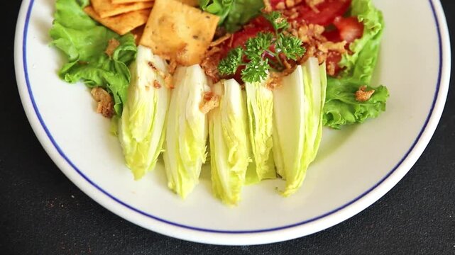 Chicory salad appetizer food preparation vegetable dish tasty snack fresh and delicious gourmet rustic food background on the table rustic food top view copy space keto and paleo diets vegetarian and 