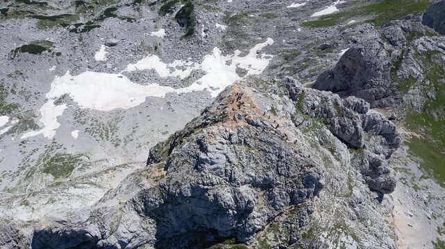 Drone View of People Standing on Bobotov Kuk Peak in Durmitor National Park, Montenegro, UNESCO World Heritage Site