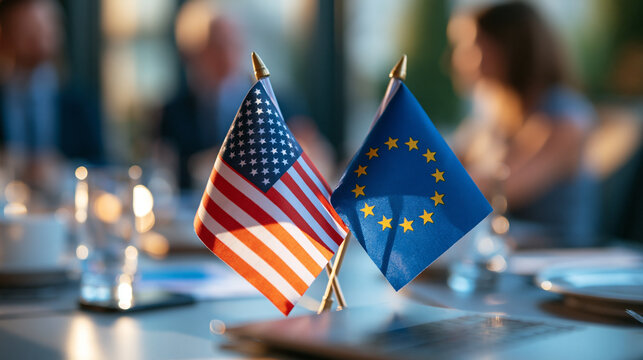 two miniature desk flags facing each other on a bright conference table, symbolizing diplomatic negotiation and bilateral relations, cooperation concept, formal meeting,