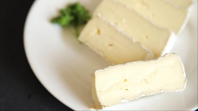 Cheese Brie or Camembert soft white-mold cheese dairy product appetizer food preparation vegetable dish tasty snack fresh, delicious gourmet, rustic food background on the table  rustic food top view 