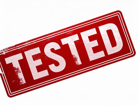red rubber stamp with the word tested and a distressed grunge texture effect isolated on white background