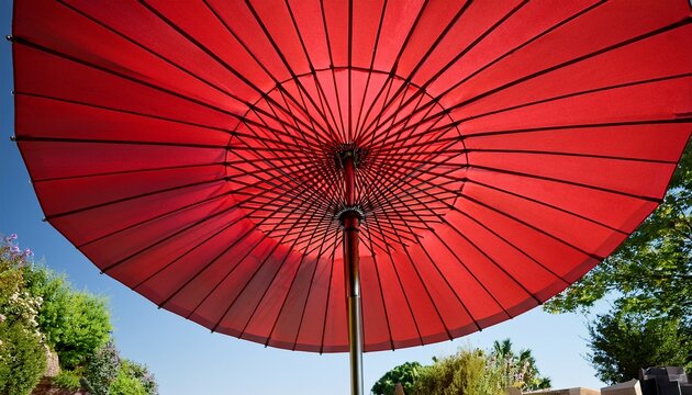 red patio umbrella with adjustable pole for outdoor shade