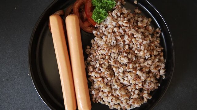 Buckwheat porridge with sausages food preparation dish tasty snack fresh and delicious gourmet rustic food background on the table&nbsp; rustic food top view copy space