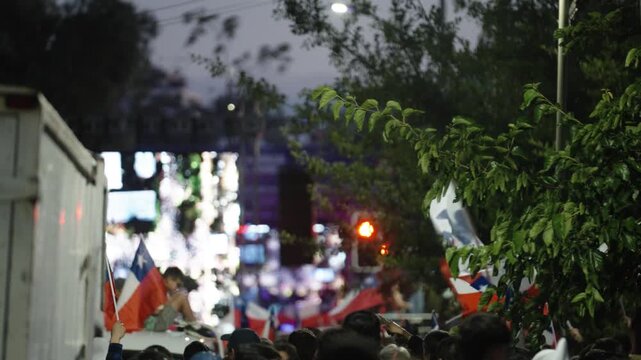 Supporters Wave Chilean Flags During Celebration After Jos&eacute; Antonio Kast Presidential Election Victory in Chile