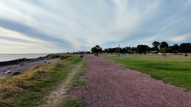 Coastal walk along the Rambla at sunset, Parque Rodo, Montevideo, Uruguay