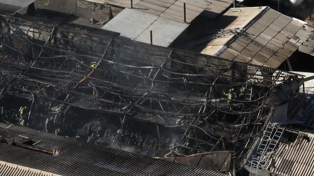 Aerial View of Fire Damaged Industrial Warehouse After Devastating Blaze